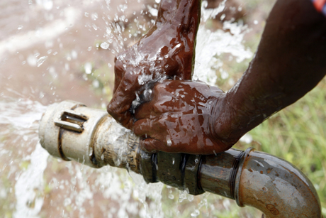 Good health depends on access to clean drinking water,: but researchers are also looking at how water management affects the prevalence of non-water borne diseases like malaria.  Photo: David Brazier/IWMI