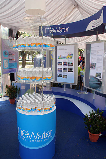 Bottles of NEWater for distribution at a public exhibition during the National Day Parade celebrations: Marina South, Singapore in 2005 Photograph by Huaiwei courtesy of Wikipedia