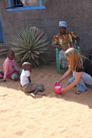 Scientist Kathleen Alexander studies disease transmission in villages in Botswana.: Photograph courtesy of M. Ramotadima, CARACAL